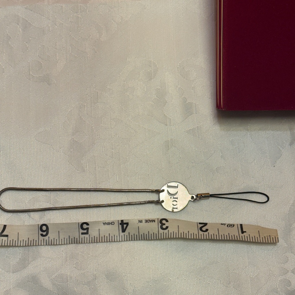 Dior Silver Case phone holder 
In decent condition Silver Dior Logo - Picture 4 of 12
